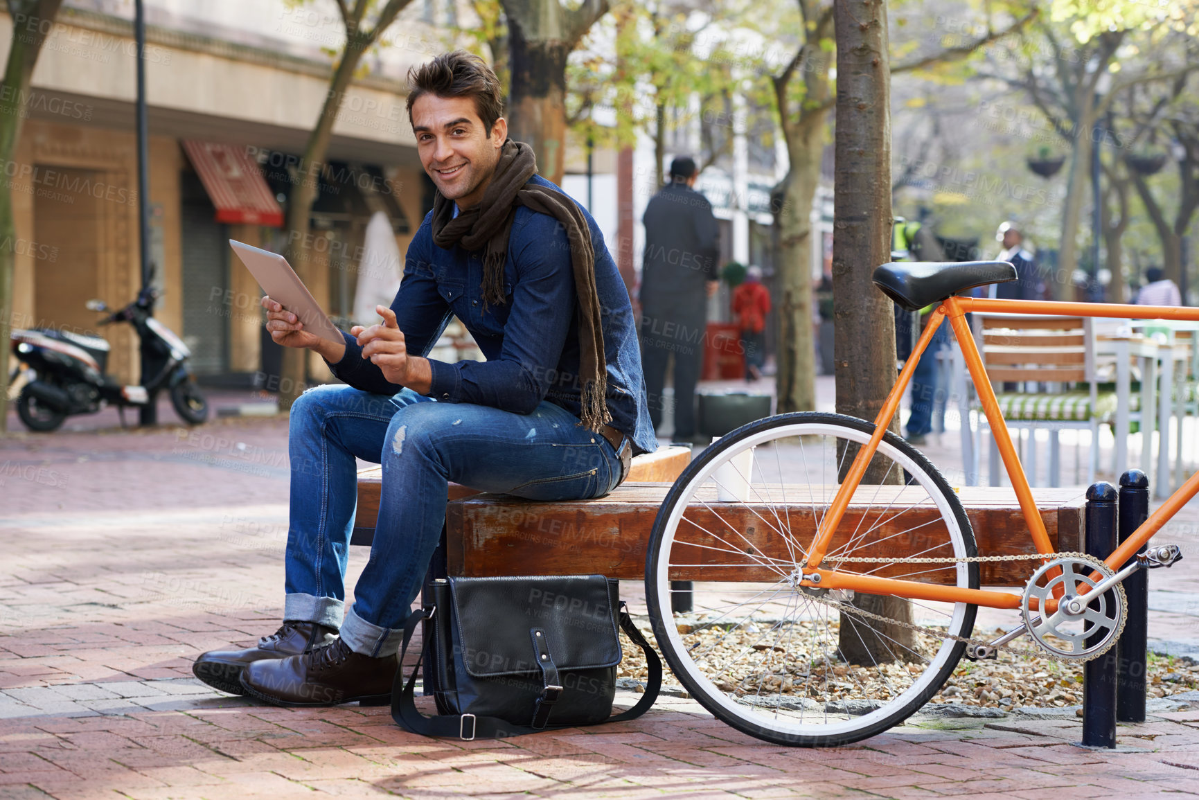 Buy stock photo Portrait, city and smile with man, tablet and bicycle with adventure and travel with internet and social media. Person, outdoor and New York with guy and technology with connection and meme with app