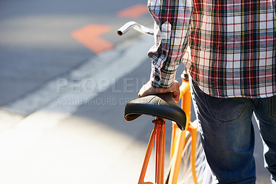 Buy stock photo Hands, person and push bicycle in city to travel on eco friendly transport outdoor, commute or walk. Cycling, back or bike in urban town, street or road for journey with rear view of seat on sidewalk