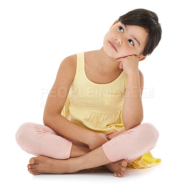 Buy stock photo A cute little girl daydreaming while isolated on white