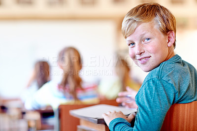 Buy stock photo Child, portrait and school desk with notebook for education in teaching lesson or knowledge, development or scholarship. Boy, face and smile or writing in classroom for project, learning or studying
