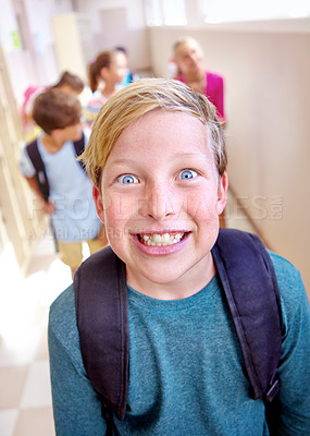 Buy stock photo Student, portrait and excited child with smile in hallway with education, study and backpack for back to school. Youth, young boy and learning on campus with children and happy from class and fun