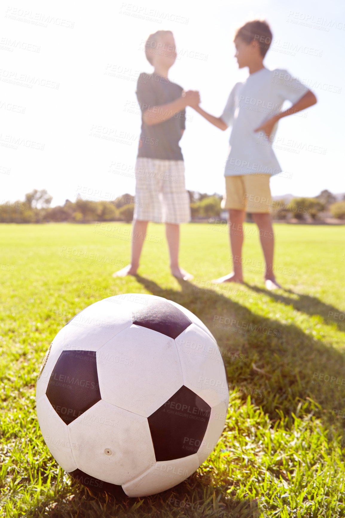 Buy stock photo Soccer, friends and team handshake on grass, agreement and partnership on football field. Children, boys and support in meeting for sports game, welcome and motivation at stadium or respect at park