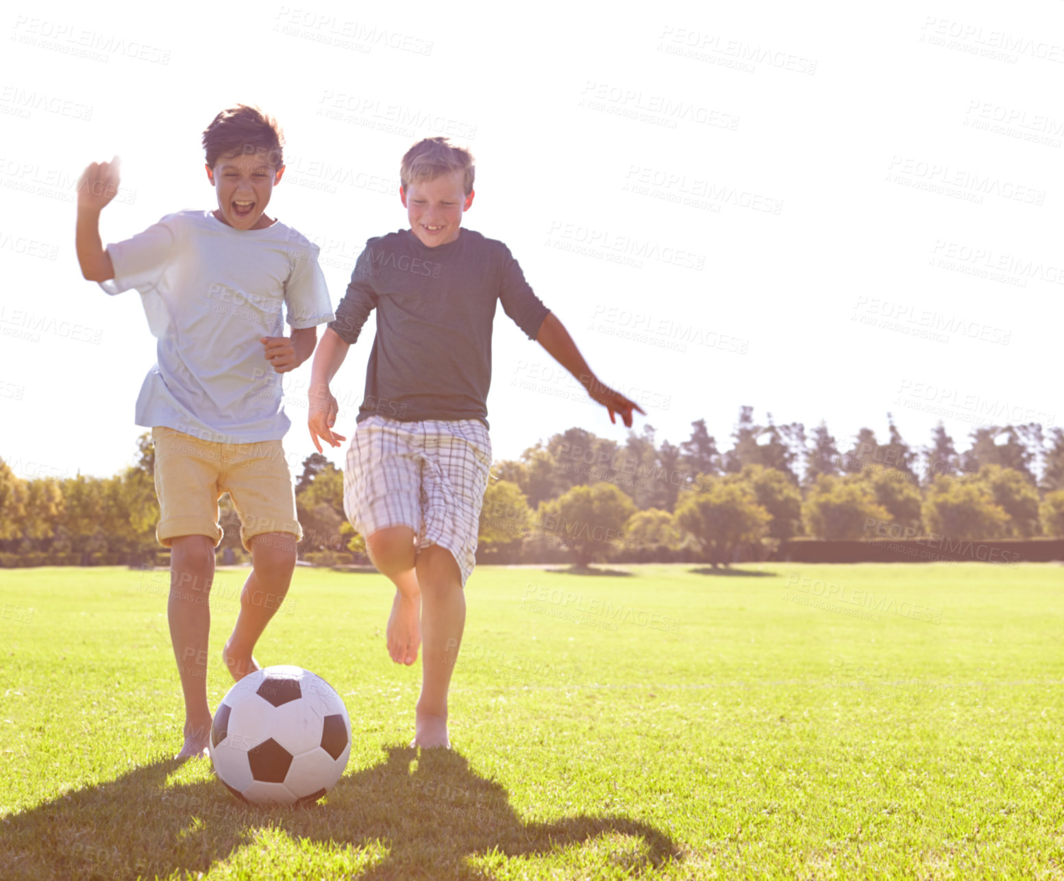 Buy stock photo Soccer, friends and happy for playing on grass, support and smiling for sports game on field. Boys, children and performance on outdoor pitch, bonding and laughing for competition or challenge