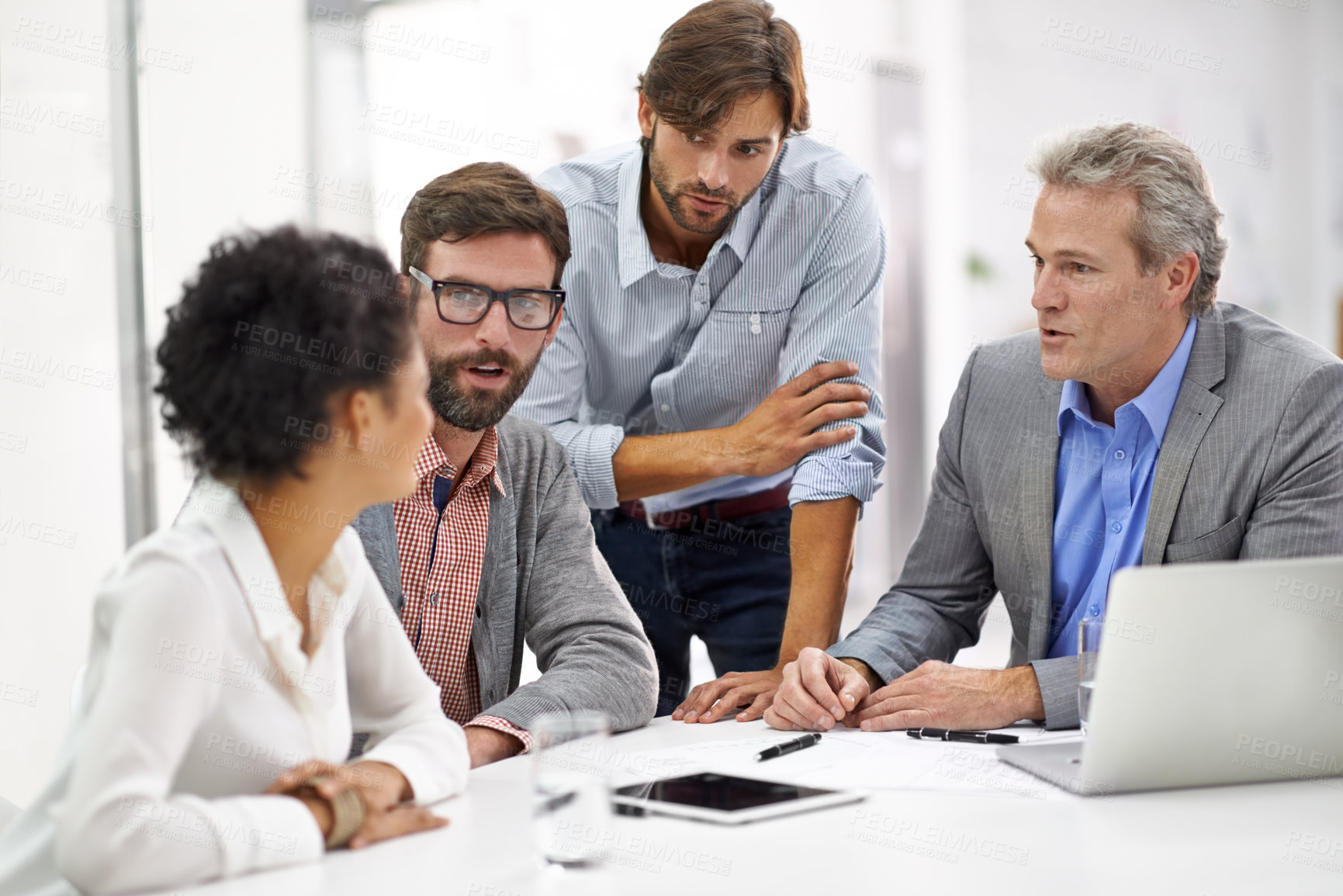 Buy stock photo Business people, meeting and team in planning, discussion or collaboration with technology at office. Group of employees with tablet and computer for project plan, ideas or brainstorming at workplace