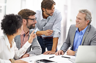 Buy stock photo Shot of a group of a diverse group of business professionals having a meeting