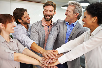 Buy stock photo Collaboration, smile and business people with hands in huddle at office for meeting, motivation or support. Teamwork, goals and target with happy employee group in workplace for celebration of bonus