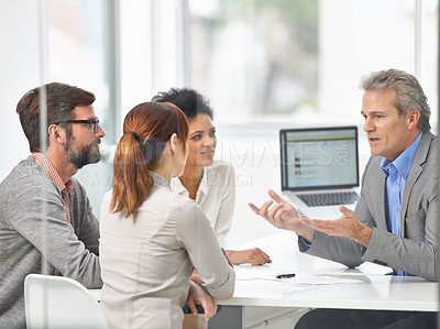 Buy stock photo Senior businessman, meeting and discussion with team in finance or coaching with documents at office. Man, CEO or executive talking to group of employees for financial growth or revenue at workplace