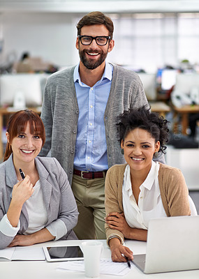 Buy stock photo Creative, team and portrait or happy in office with laptop, tablet and paperwork for web design and planning. Collaboration, employees and face with technology in meeting for project with diversity