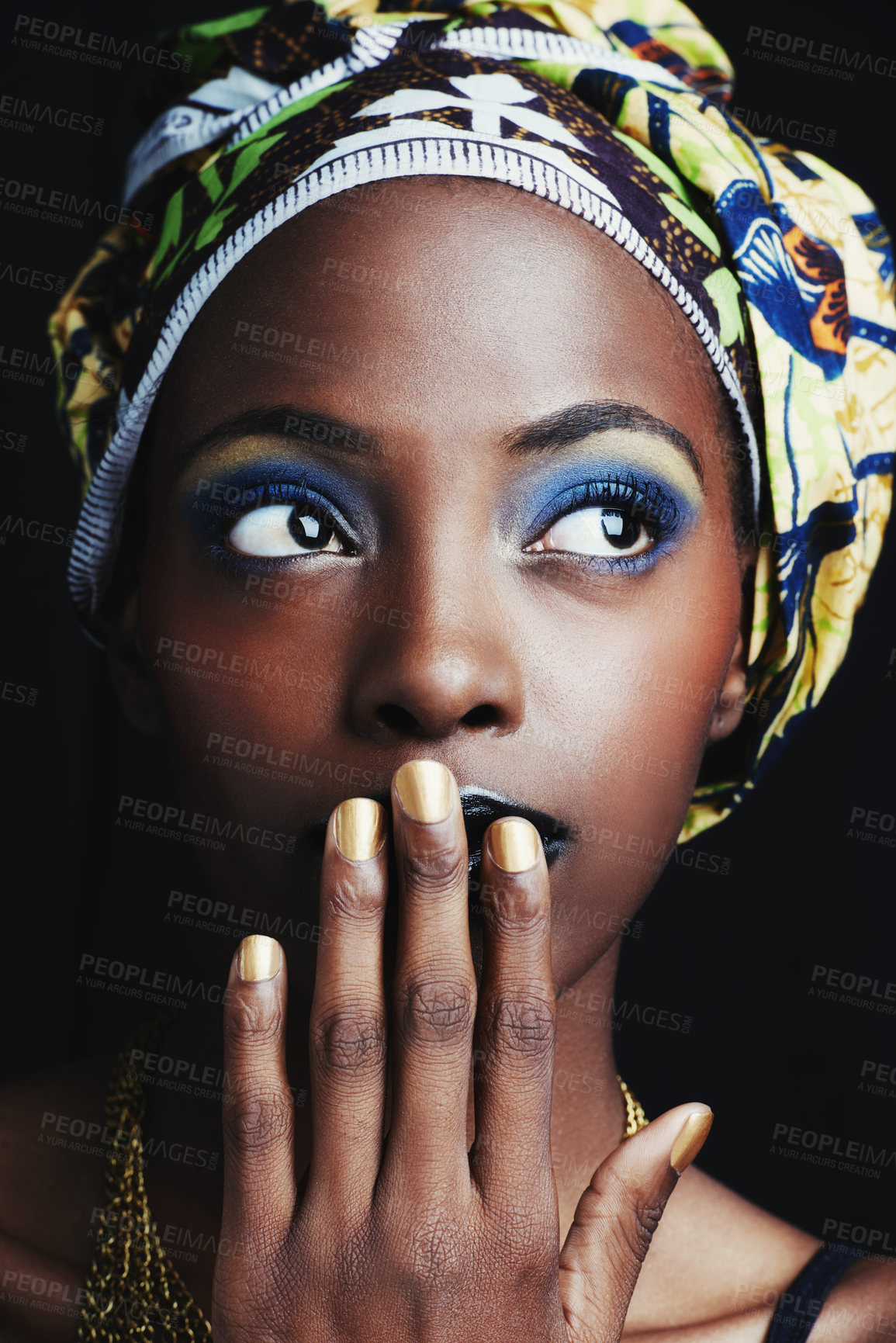 Buy stock photo A beautiful african woman posing against a black background