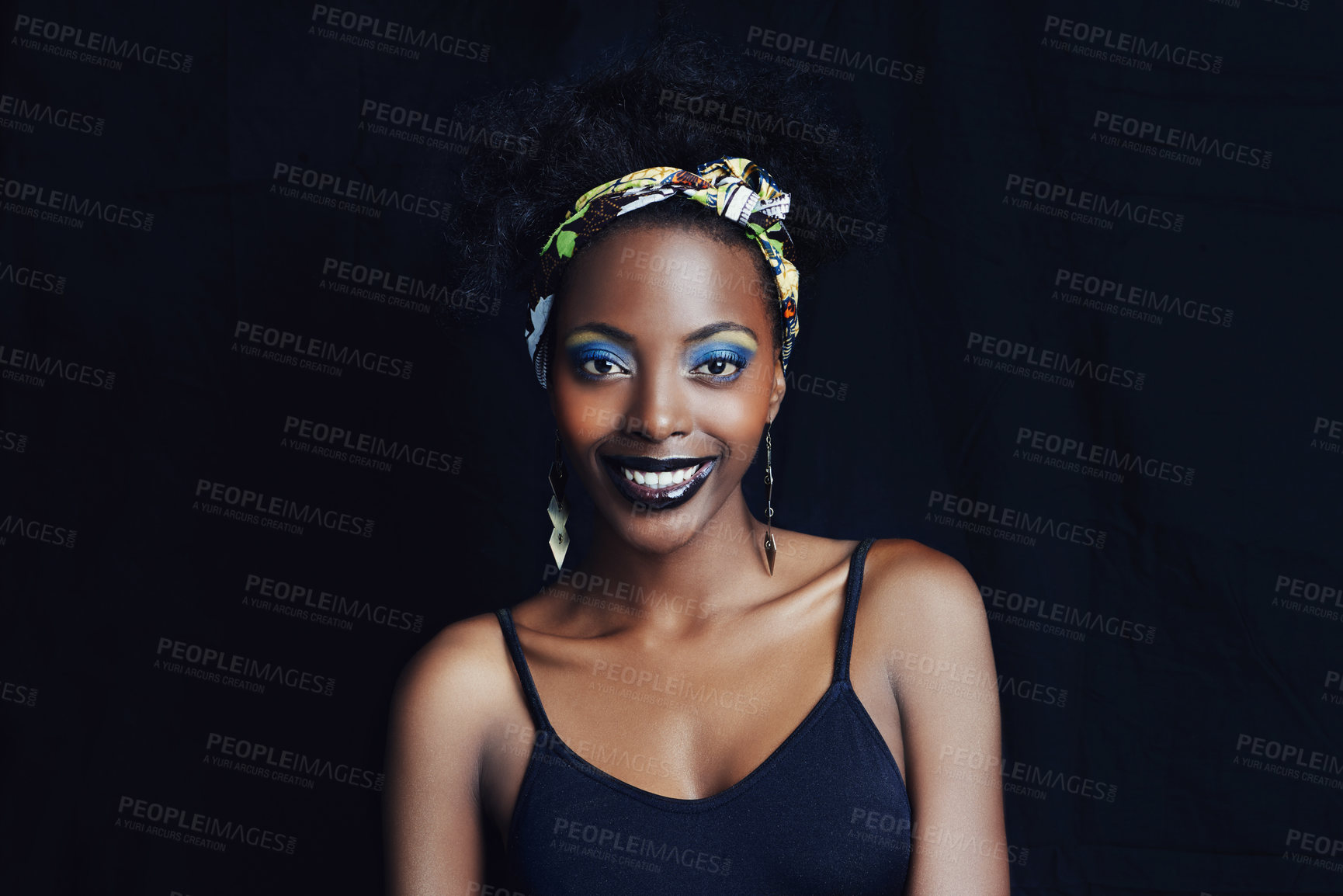 Buy stock photo African woman, fashion and studio for makeup, beauty and smile for eye shadow campaign. Black female model, dark background and cosmetic, portrait and face for cultural, style and elegance  
