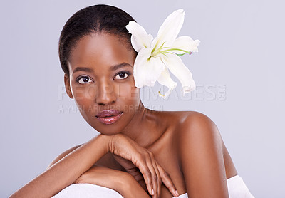 Buy stock photo Black woman, glow and flower for natural beauty, organic cosmetics and shine from skincare on white background. Healthy skin, wellness and self care with facial treatment, eco friendly and nature