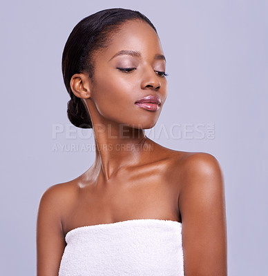 Buy stock photo Beauty, skincare and face of black woman with confidence, glowing skin and natural spa makeup in studio. Serious, dermatology and shine facial with cosmetics on girl isolated on purple background.