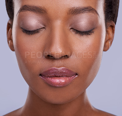 Buy stock photo Skin, face and makeup, black woman with beauty and healthy glow, natural cosmetics for wellness on grey background. Eyeshadow, peace and calm for dermatology, antiaging and skincare in studio