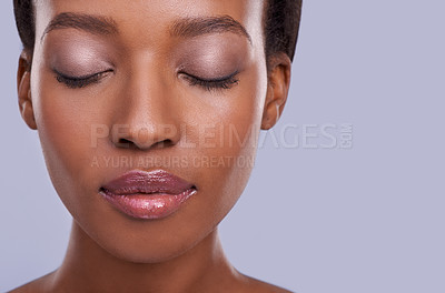 Buy stock photo Skincare, face and makeup, black woman with beauty and healthy glow, natural cosmetics for wellness on grey background. Eyeshadow, peace and calm for dermatology, antiaging and mockup space in studio