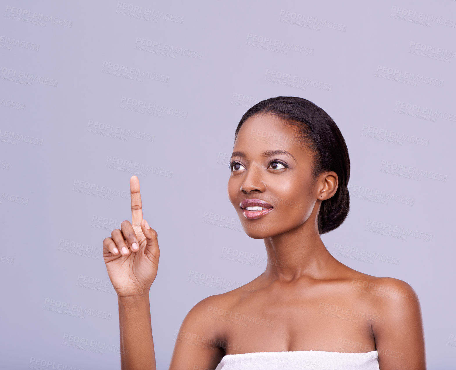 Buy stock photo Beauty, touch screen and woman in studio isolated on purple background for skincare interface. Access, pointing or finger on mockup and African customer or user at spa to select treatment option