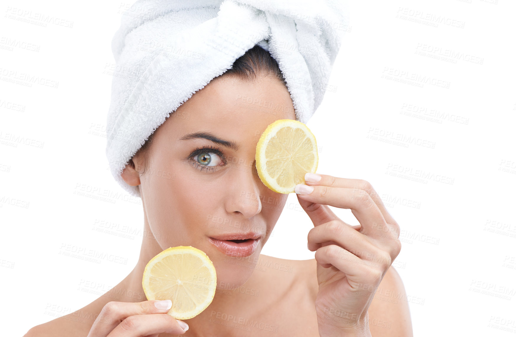 Buy stock photo Woman, skincare and lemon in studio for facial beauty, cosmetics and natural product or vitamin c in portrait. Face of a young model with fruits for eye dermatology with towel on a white background 