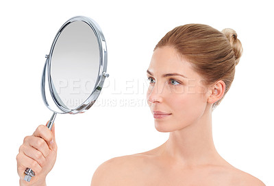 Buy stock photo Woman, mirror and skincare with check in studio for glow, cosmetics or healthy by white background. Girl, person or model with facial skin, beauty or results with reflection, dermatology or aesthetic