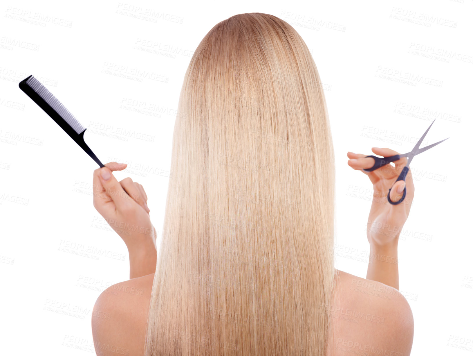 Buy stock photo Rearview shot of a blonde woman holding scissors and a comb