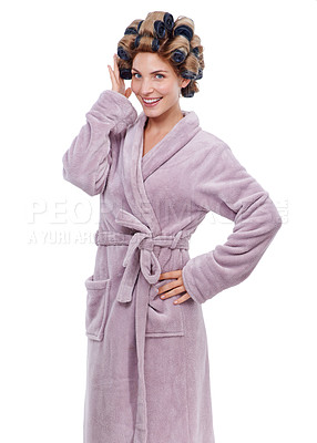 Buy stock photo Portrait, hair and woman with curlers in studio, morning routine and preparation for hairstyle. Female person, cosmetic treatment and rollers for grooming, white background and robe for beauty