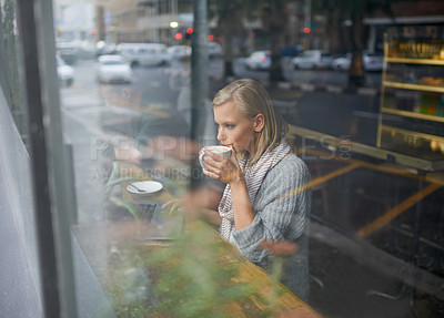 Buy stock photo Coffee shop, laptop and woman with drink for remote work in window for internet, website and research. Restaurant, relax and girl on computer for freelance career, working and email with cappuccino