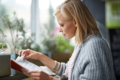 Buy stock photo Coffee shop, relax and woman with book reading by window with drink, cappuccino and latte. Cafeteria, restaurant and happy person with story, literature and novel for knowledge, learning and hobby
