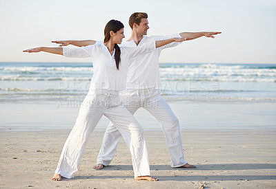 Buy stock photo Couple, yoga and arms out, fitness on beach for zen and wellness, travel and mindfulness with holistic healing. People outdoor, exercise and balance, workout together for bonding with sea and nature