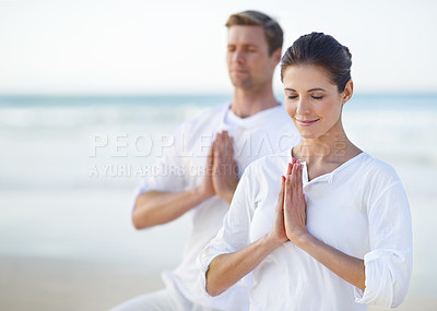Buy stock photo Couple, yoga and ocean with meditation, peace and sitting on sand in morning with mindfulness in summer. Man, woman and outdoor for namaste with spiritual growth, balance or zen at beach in Cape Town