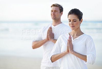 Buy stock photo Couple, yoga and ocean with meditation, zen and waves on sand in morning with mindfulness in summer. Man, woman and outdoor for namaste with spiritual growth, balance or peace at beach in Cape Town