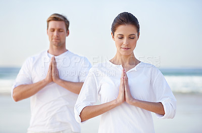 Buy stock photo Couple, yoga and meditation on beach, prayer for zen and wellness, travel and mindfulness with holistic healing. People outdoor, exercise and peace, workout together for bonding with sea and nature
