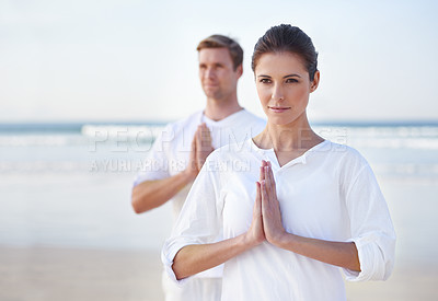 Buy stock photo Prayer, yoga and couple on beach in morning for fitness, exercise and mindfulness in lotus pose. Nature, love and man and woman by ocean for meditation, wellness and healthy body outdoors together