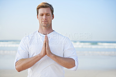 Buy stock photo Man, meditation on beach and prayer for zen, wellness and holistic healing outdoor for calm and yoga. Ocean, fresh air and travel with mindfulness for peace of mind, wellbeing and spiritual in nature