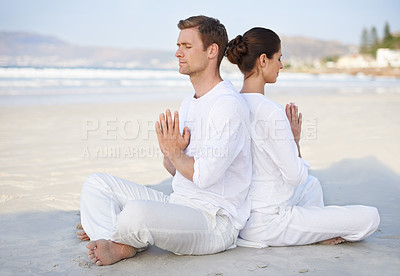 Buy stock photo Couple, yoga and beach with meditation, peace and sitting on sand in morning with mindfulness in summer. Man, woman and outdoor for namaste with spiritual growth, balance or zen by ocean in Cape Town
