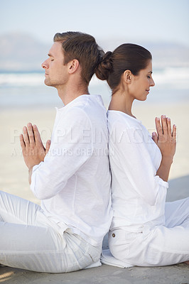 Buy stock photo Couple, yoga and sea with meditation, peace and waves on sand in morning with mindfulness in summer. Man, woman and outdoor for namaste with spiritual growth, balance and zen at beach in Cape Town