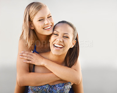 Buy stock photo Friends, women and happy with piggyback in studio for bonding, relax or vacation in summer with swimwear. People, embrace and support with mock up space for holiday and adventure on white background