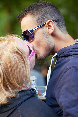 Buy stock photo Kissing, fun and outdoor with couple, love and excitement with happiness and marriage with weekend break. People, culture and man with woman or romance with relationship and summer with vacation