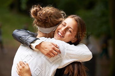 Buy stock photo Forest, hug and smile with women, friends and sunshine with happiness or summer with weekend break. Embrace, park or girls with fun or excitement with reunion or support with joy or bonding together