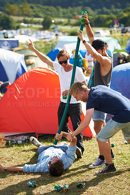 Buy stock photo Beer, music festival or drunk friends drinking together on vacation or outdoor social event in summer. Concert, crazy party games celebration or excited people with hose funnel or alcohol pipe tube