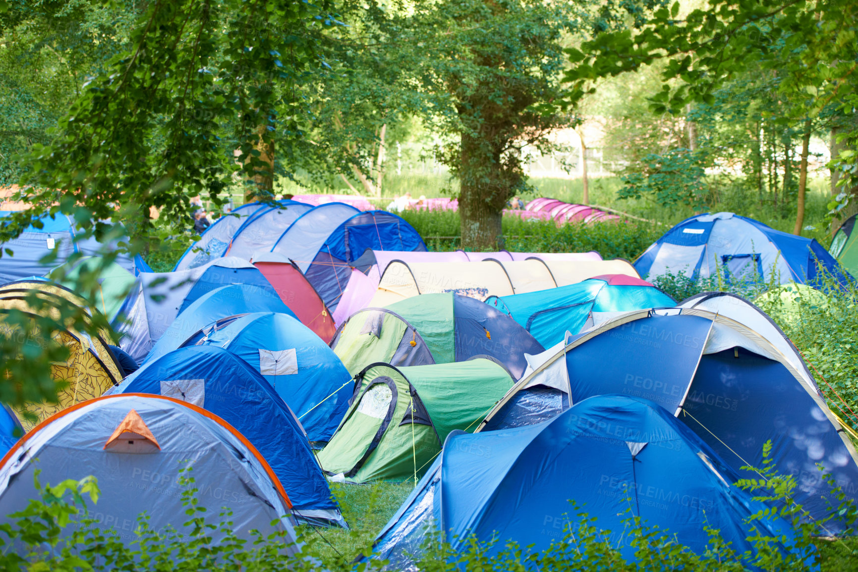 Buy stock photo Camping, tents and outdoor music festival in park on holiday or vacation in summer forest. Camp, site and shelter setup at party, event or travel in woods for concert, adventure and crowded carnival