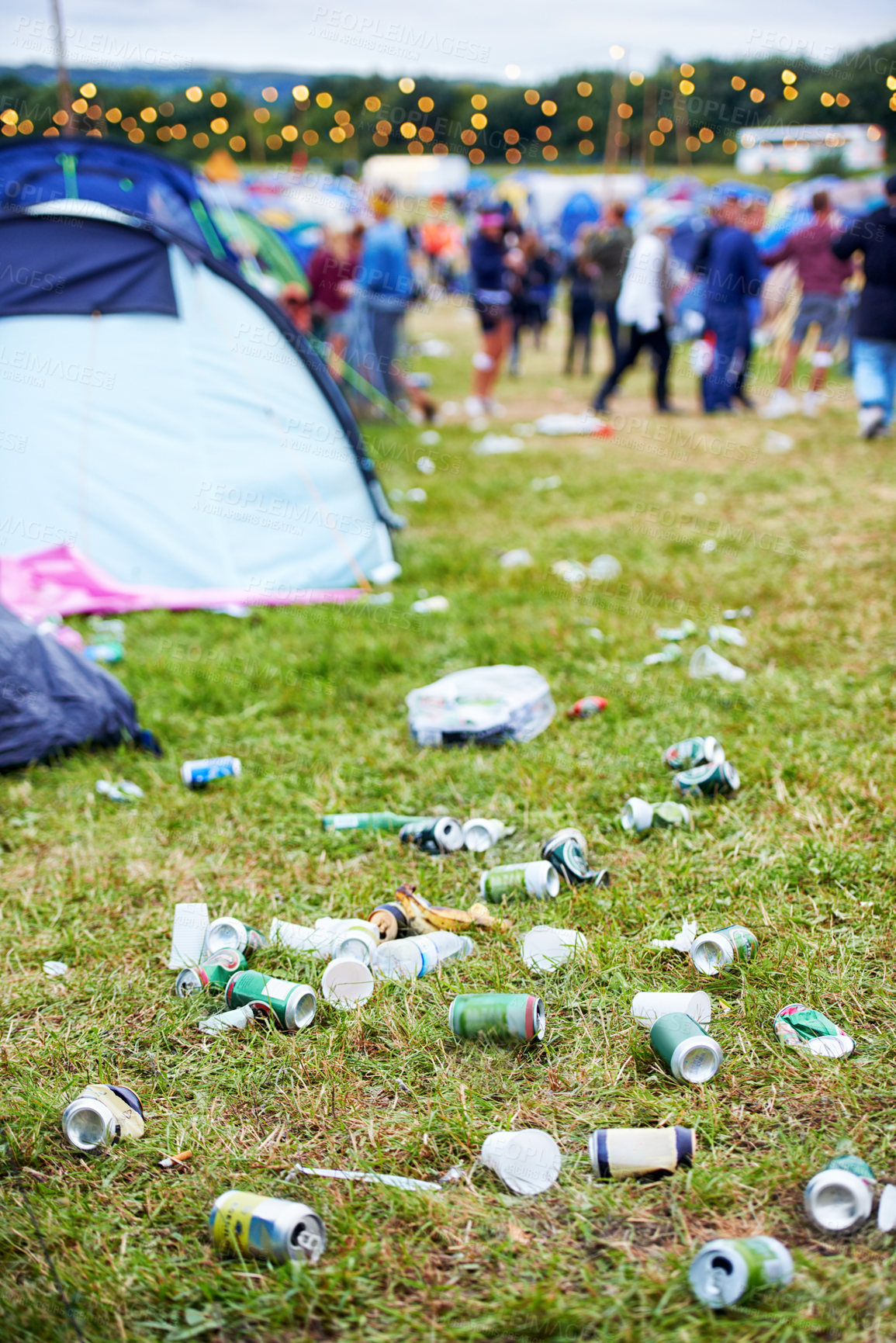Buy stock photo Field, festival and litter with drinks, beer and beverage product for drinking a can in party. Concert outdoor pollution or alcohol on ground, grass or floor by trash or garbage with dirt or mess