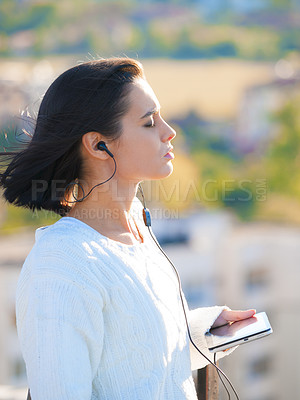Buy stock photo Woman, city and earphones with tablet, podcast or music for listening or relaxing while thinking. Worker, technology and mental health with audio, mindfulness and media for wellness and ideas or zen