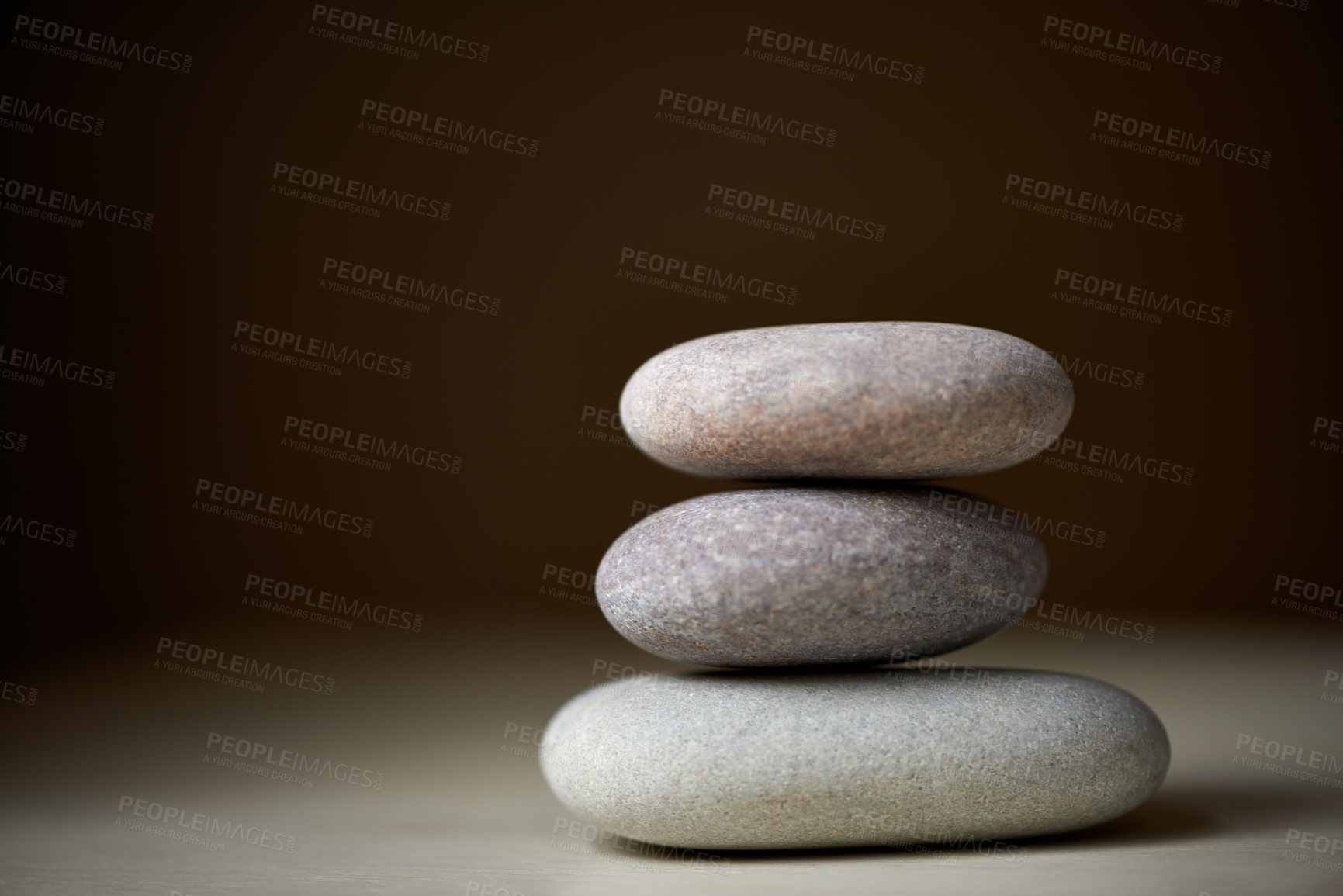 Buy stock photo Pile, studio or stones at spa for healing, massage or wellness treatment therapy for balance. Stack, aromatherapy and rocks for a calm, zen or peace atmosphere at a natural salon on black background