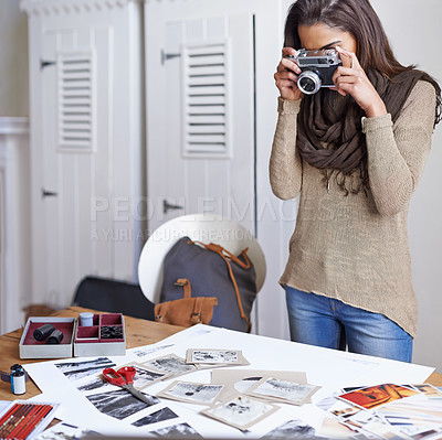 Buy stock photo Woman, photographer and film camera for picture of images in portfolio for concept board, creative or photoshoot. Female person, equipment and snap shot in studio for art career, catalog or hobby