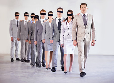 Buy stock photo Business people, blindfold and leader for team confidence, united and lost in workplace. Management, employees and collaboration in uncertainty, control strategy and support in direction or workforce
