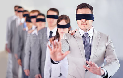 Buy stock photo Business people, blindfold and leader in office, team and solidarity in workplace. Challenge, employees and collaboration in uncertainty, control strategy and support in searching or workforce