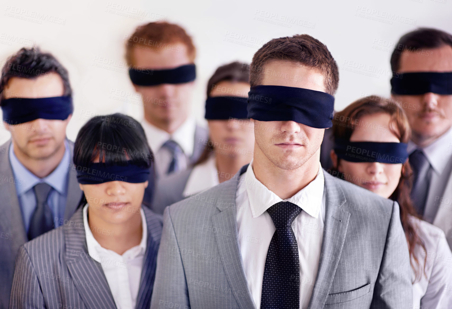 Buy stock photo Shot of a group of businesspeople all wearing blinfolds