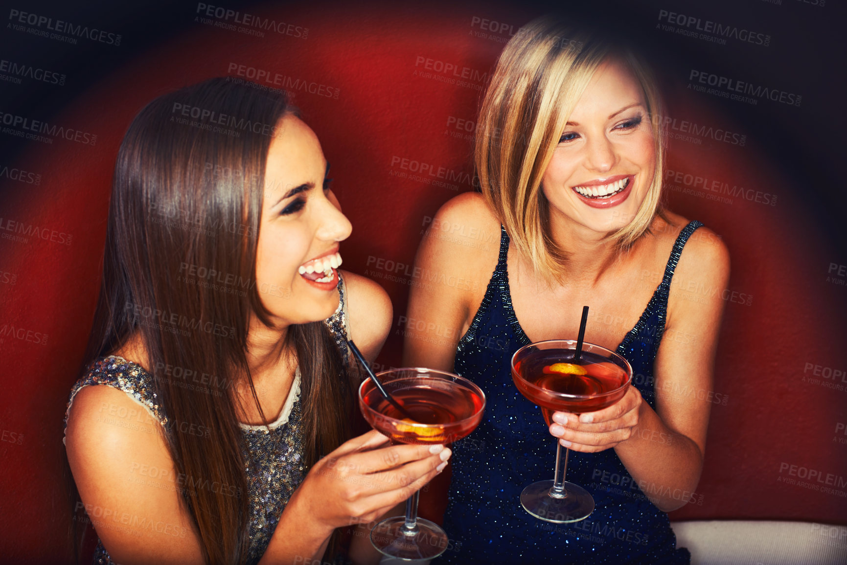 Buy stock photo Smile, cocktails and women talking at event for party, bonding or happy hour together. Laugh, conversation and confident young female friends with alcohol drinks at night club for celebration and fun