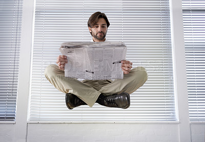 Buy stock photo Levitating, business and man with newspaper, relax and employee with consultant and professional in workplace. Person, entrepreneur and guy with information and reading with hovering and office