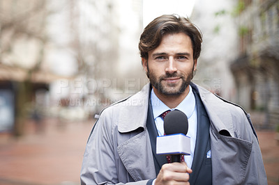 Buy stock photo Portrait, broadcast and a man with a microphone in the city for an interview or tv journalist. Smile, media and a male reporter talking with a mic for press, anchor job and reporting the news