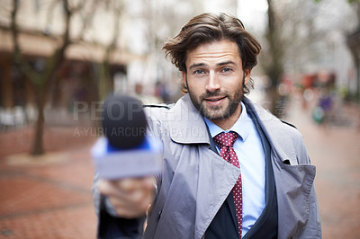 Buy stock photo Microphone, city and interview with man, reporting and live streaming with broadcast and journalism. Portrait, person and employee with questions and feedback with breaking news and mic with opinion