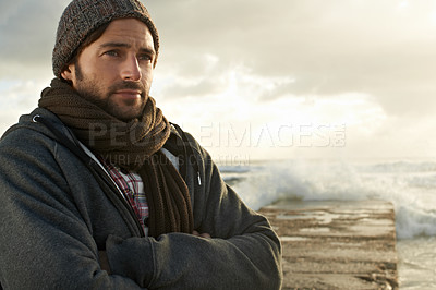 Buy stock photo A handsome young man at the beach